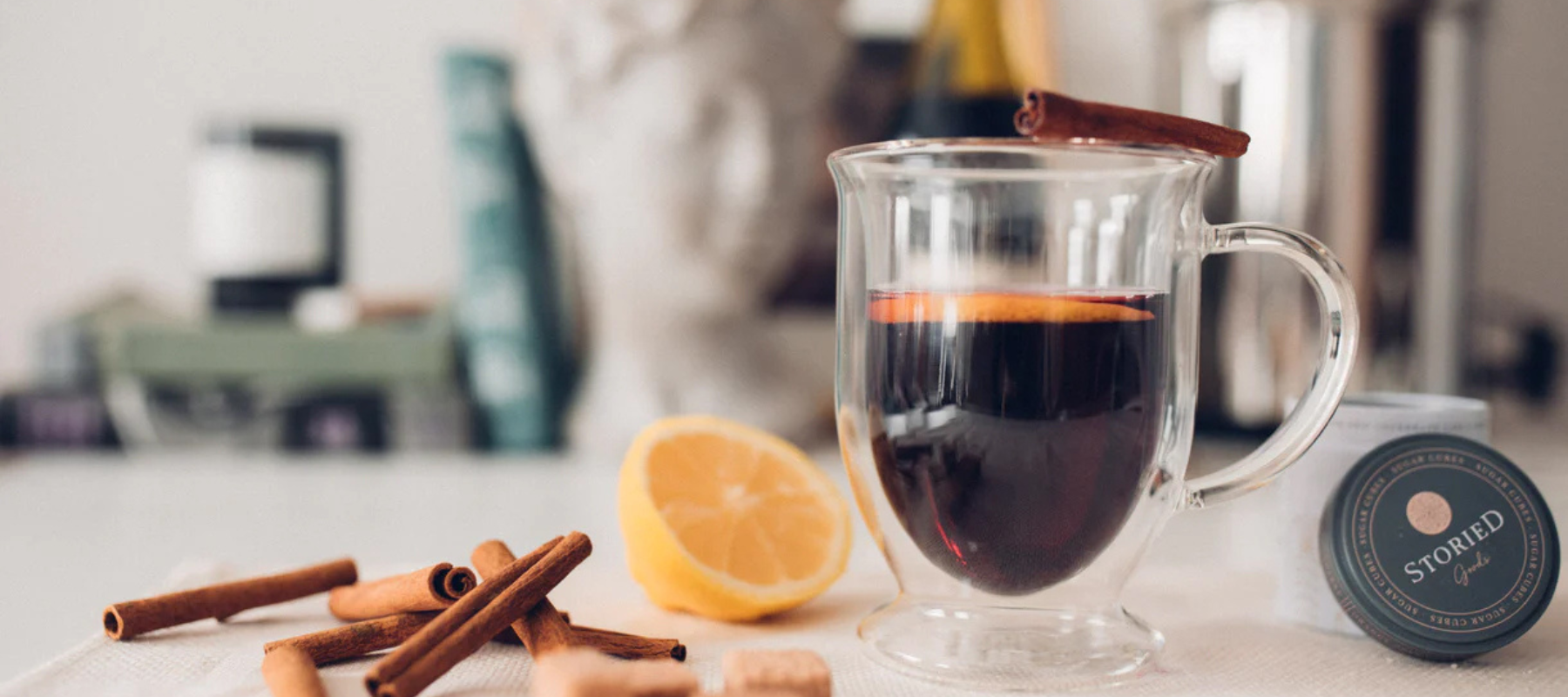 Storied Goods' Mulled Wine with oranges, cinnamon sticks, and sugar cubes