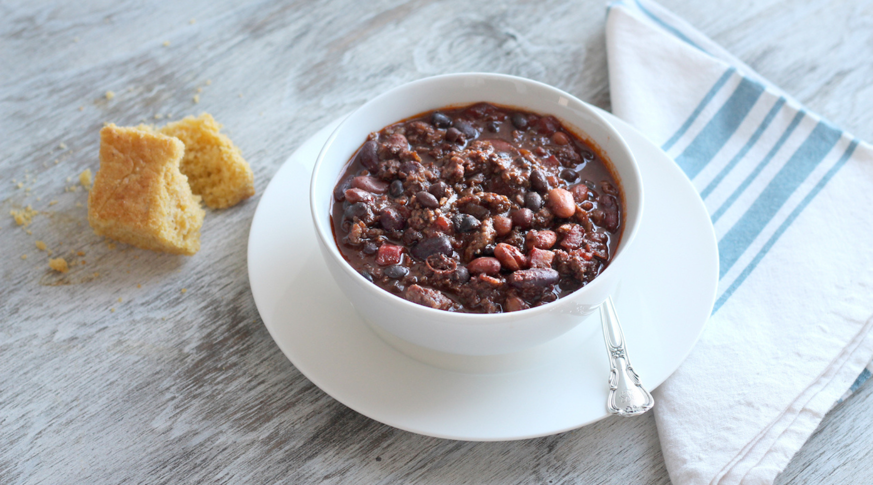 Bowl of chili with cornbread