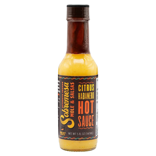 Bottle of Sobremesa's Citrus Habanero hot sauce with a black label on a white background