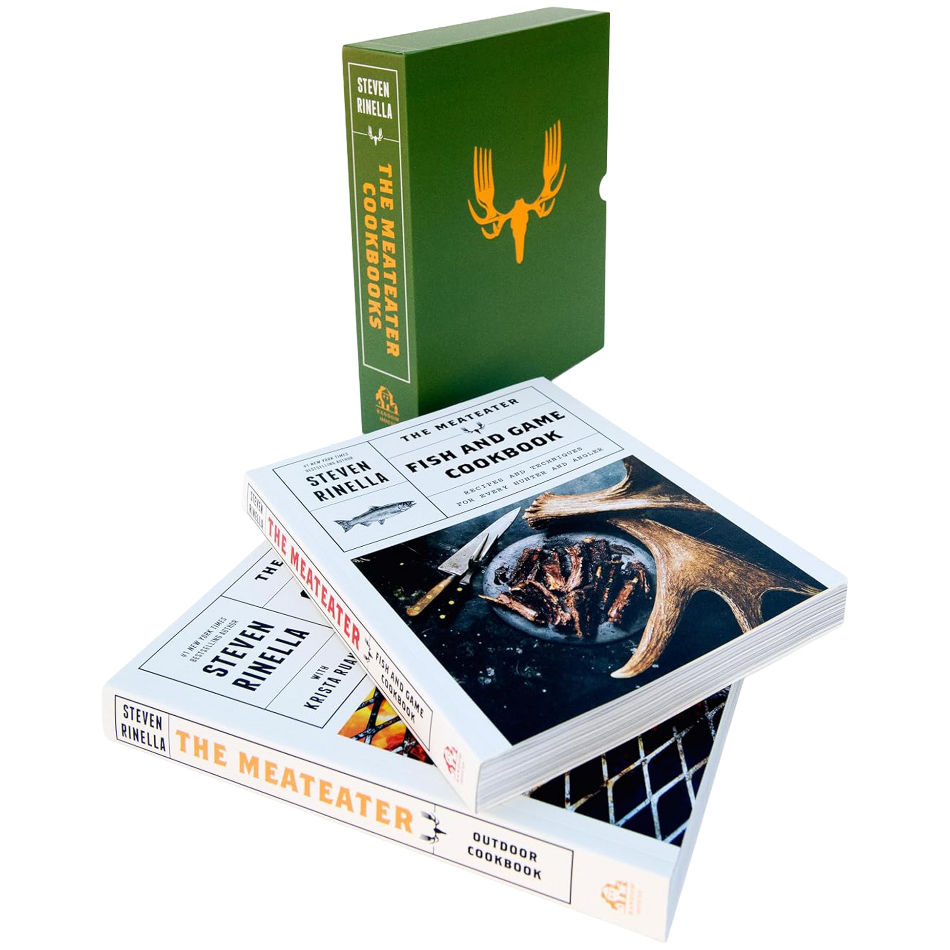 Copies of The Meat eater: Fish and Game Cookbook and Outdoor Cooking by Steven Rinella are stacked on a white background, with the box set standing upright behind them. The books have white covers with black and gold text, and the top book cover features a large antler graphic.