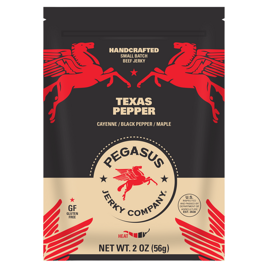 A 2 oz bag of Pegasus Jerky Company Texas Pepper beef jerky, featuring a black and beige design with red winged horses and the product name 'Texas Pepper'.